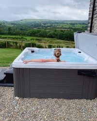 The Barn Hot Tub and view from Capel Colman Holiday Cottages