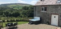 Hotub and view from The Barn Family-Friendly Pembrokeshire Cottage
